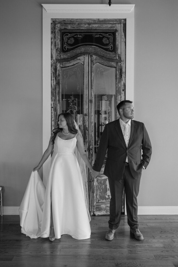 indoor bride and groom portraits with intentional wedding details