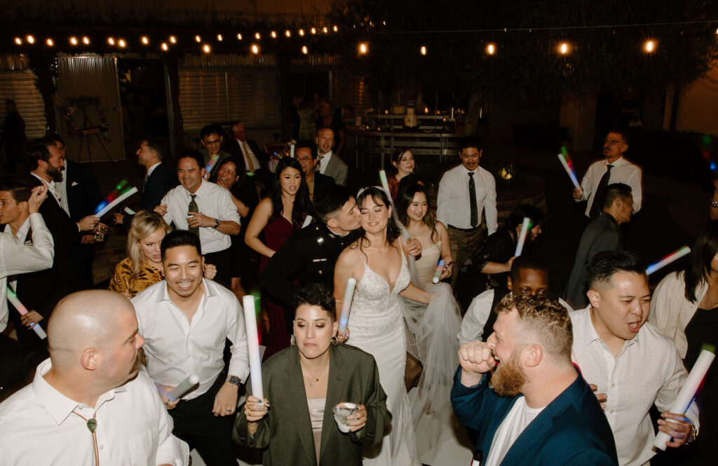 wedding guests dancing at reception