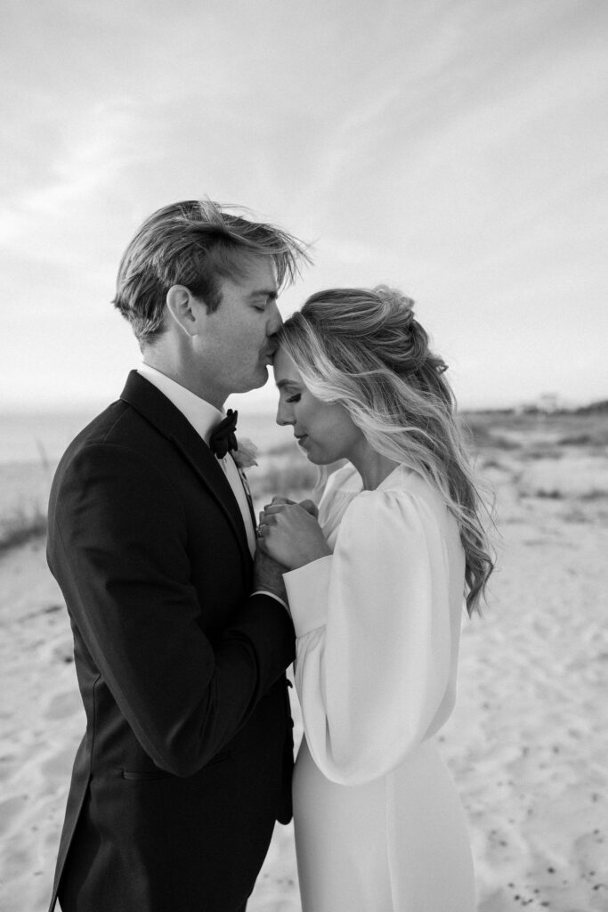 bridals on the beach beach bride and groom portraits candid poses