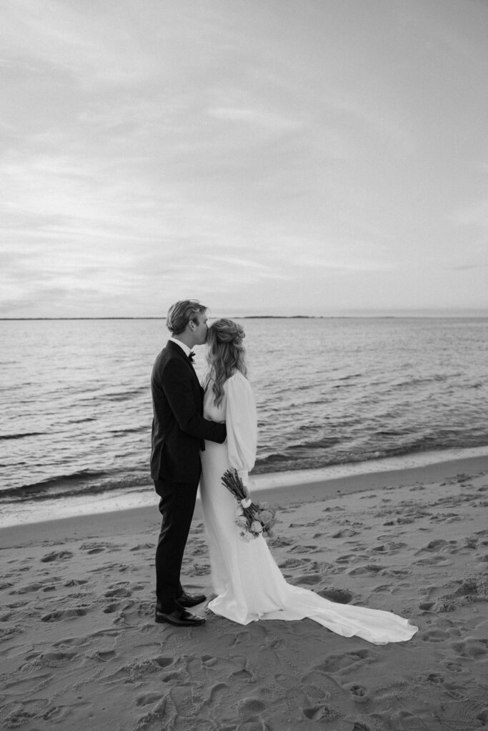 black and white bride and groom portraits on the beach in florida
