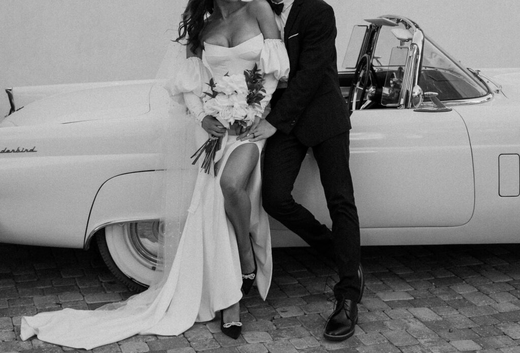 black and white documentary style elopement photos and editorial elopement photos with vintage car
