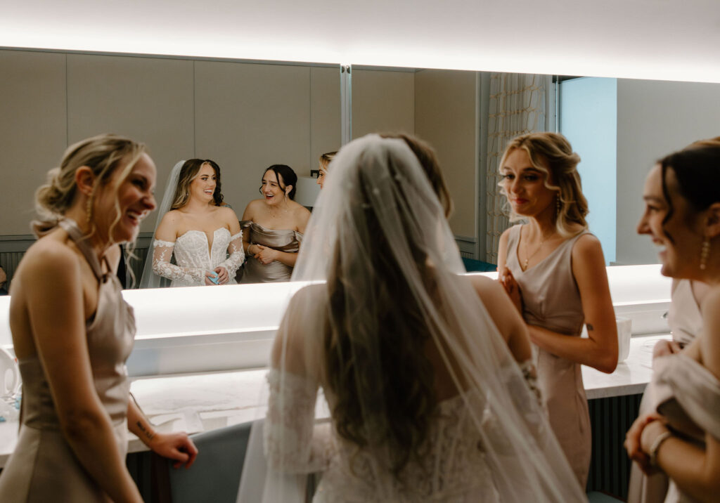 bridesmaids and bride getting ready for florida wedding ceremony